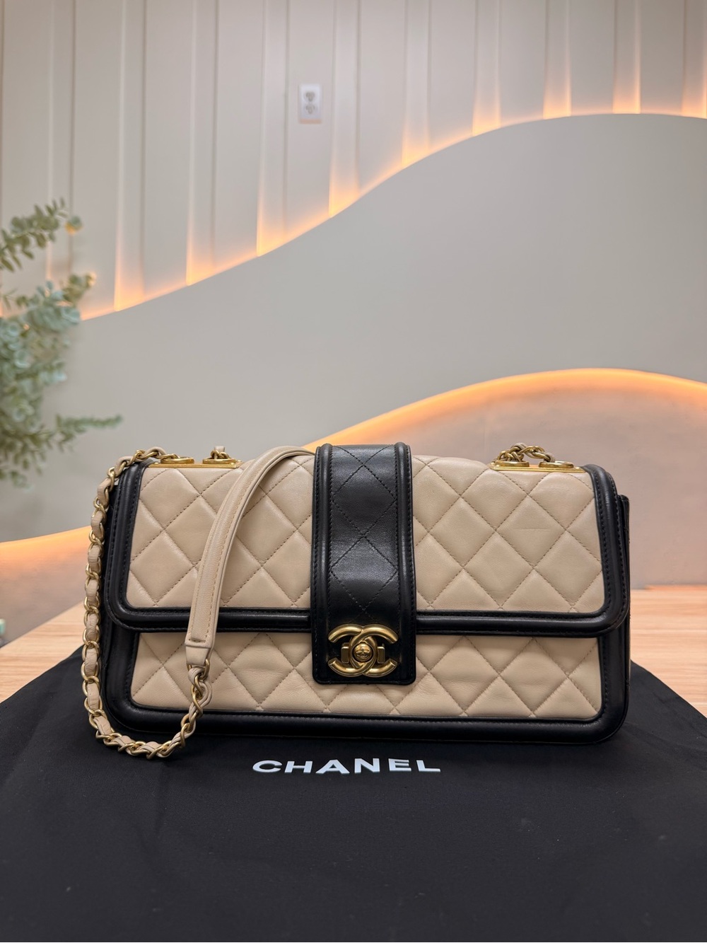CHANEL Beige and Black Quilted Shoulder Bag with Gold Hardware